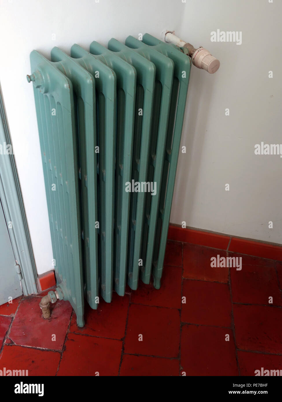 French Vintage cast iron radiator Stock Photo - Alamy