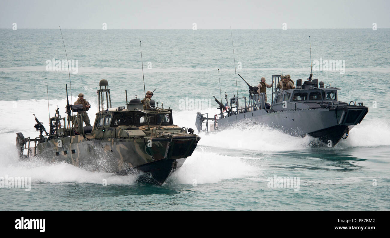 151103-N-CJ186-832 ARABIAN GULF (Nov. 3, 2015) Commander, Task Group (CTG) 56.7’s 7 Riverine Command Boats (RCB) 802 and 805 participate in a bi-lateral exercise with Kuwait naval forces in the Arabian Gulf. The combined-joint exercise provided U.S. forces, which also included U.S. Coast Guard and U.S. Army, an opportunity to exchange tactics and best practices with Kuwait naval forces. CTG 56.7 conducts maritime security operations to ensure freedom of movement for strategic shipping and naval vessels operating in the inshore and coastal areas of the U.S. 5th Fleet area of operations. (U.S. N Stock Photo