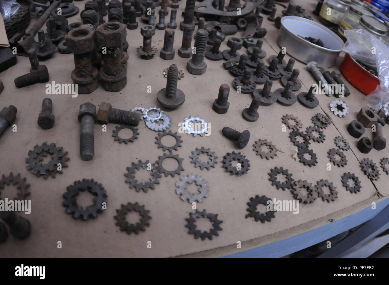 washers-screws-and-bolts-sit-atop-a-workbench-in-the-motor-pool-a