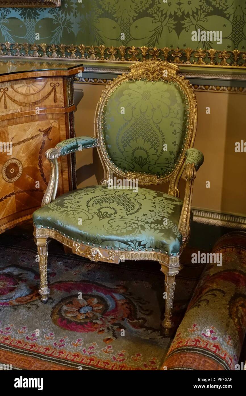 Armchair by Thomas Chippendale, 1773, giltwood , State Bedroom - Harewood House - West Yorkshire, England - Stock Photo