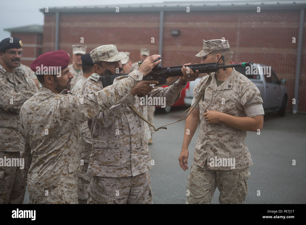 Members of the royal saudi marine force rsmf look down the sights of
