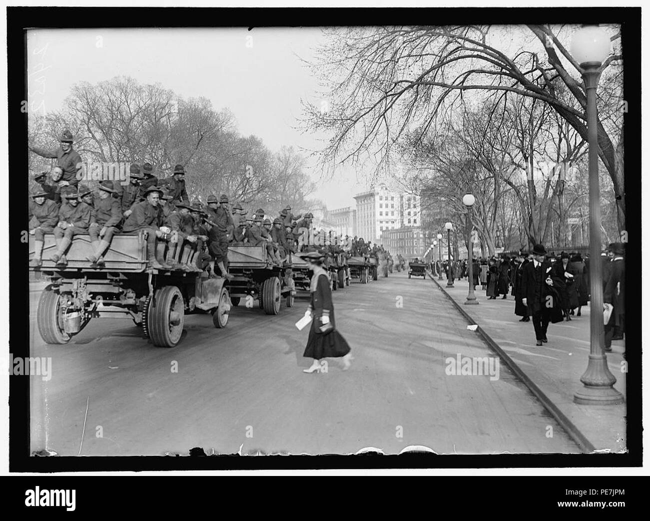 ARMY, U.S. SOLDIERS GOING THROUGH CITY IN TRUCKS AND AUTOS Stock Photo ...