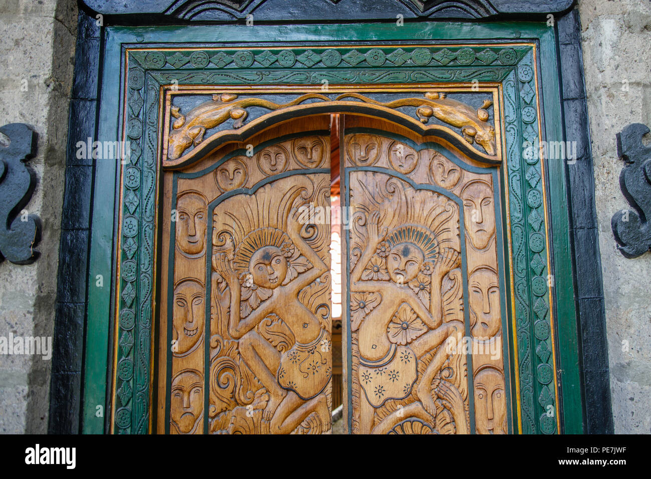 Carved wooden doors of Balinese house, Bali, Indonesia. Stock Photo