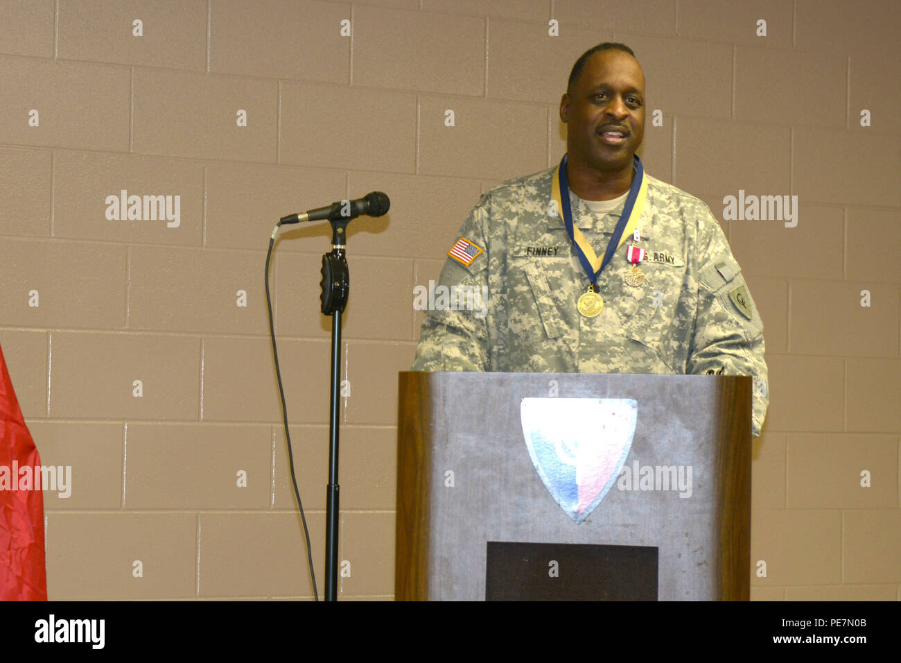 Indiana Army National Guard Lt. Col. Walter Finney speaks at his retirement ceremony at the Cyclone Division Armory in Indianapolis, Saturday, Oct. 17, 2015. Finney retired with 30 years in the Indiana National Guard last serving as the 38th Infantry Division’s headquarters battalion’s commander. (Photo by Sgt. 1st Class Jeff Lowry) Stock Photo