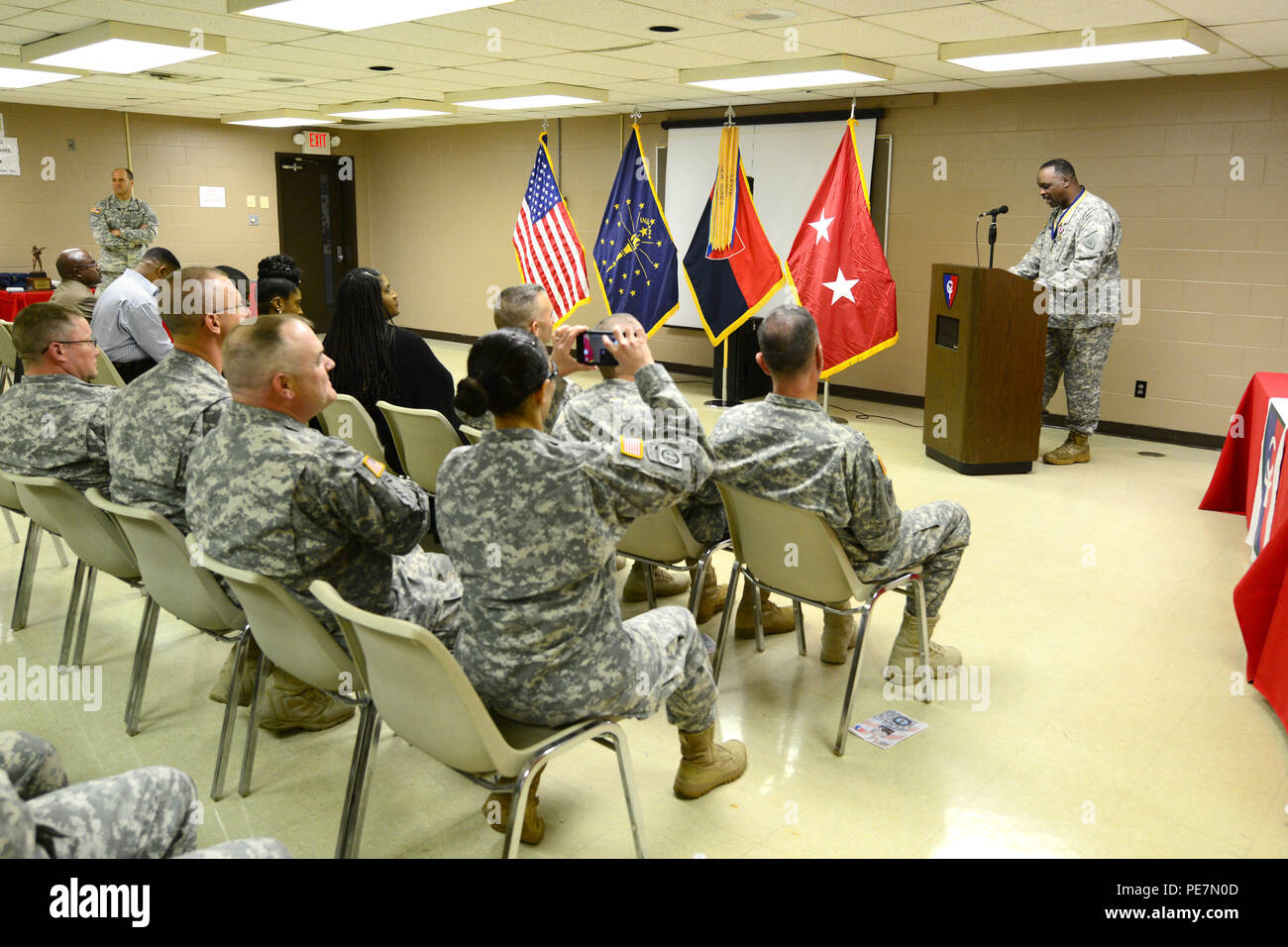 Indiana Army National Guard Lt. Col. Walter Finney speaks at his retirement ceremony at the Cyclone Division Armory in Indianapolis, Saturday, Oct. 17, 2015. Finney retired with 30 years in the Indiana National Guard last serving as the 38th Infantry Division’s headquarters battalion’s commander. (Photo by Staff Sgt. Lorne W. Neff) Stock Photo
