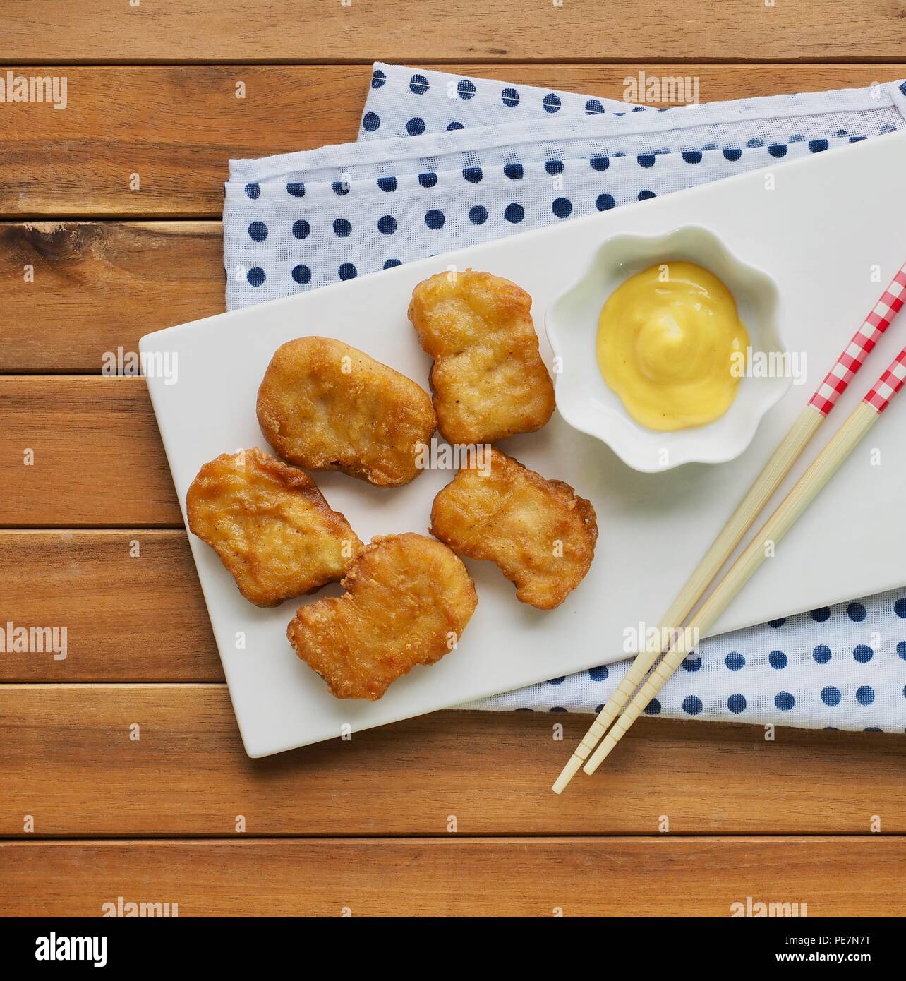 Chicken nuggets and honey mustard sauce Stock Photo Alamy