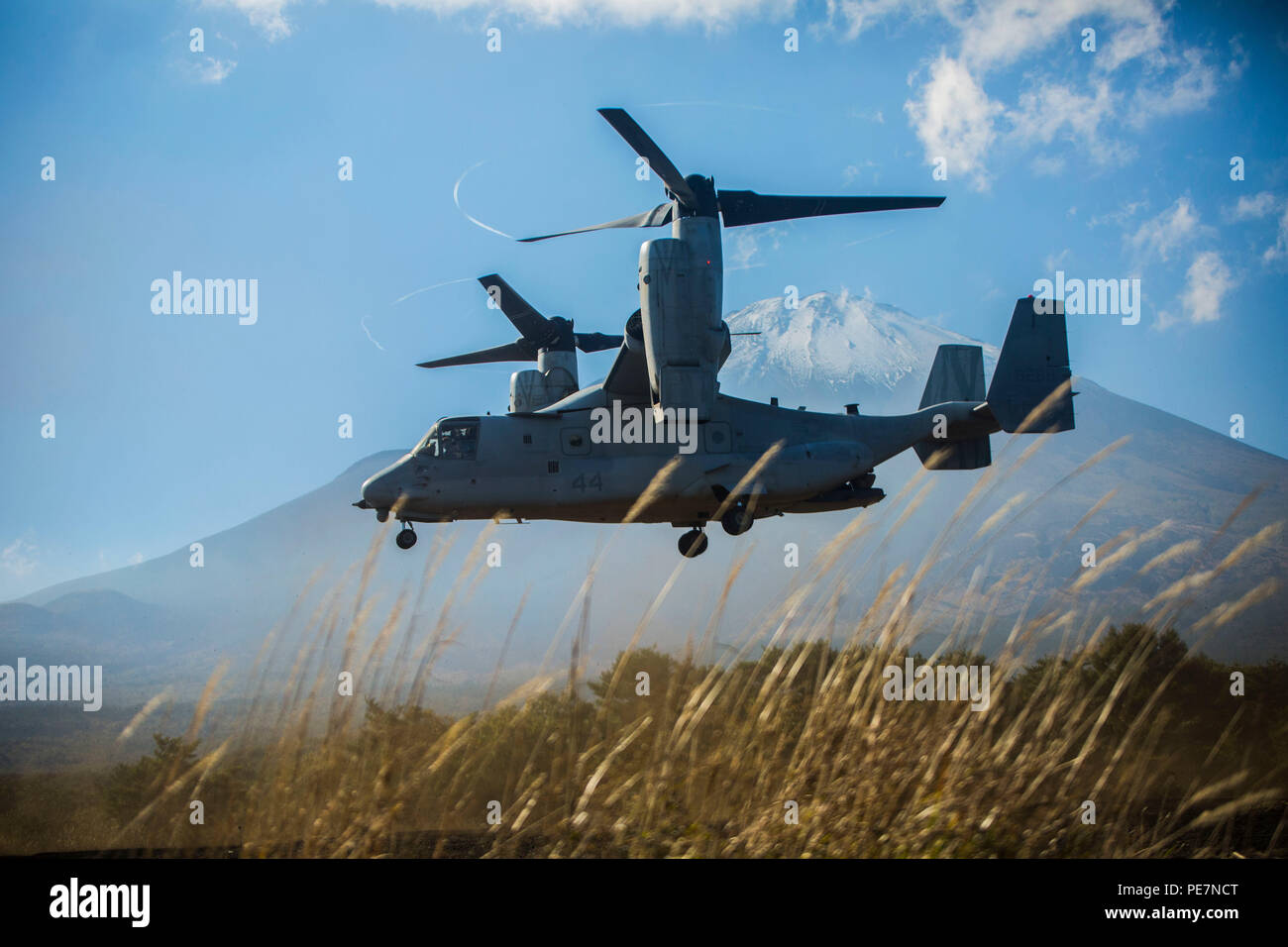 A MV-22B Osprey and its crew conduct mountain area training at Mt. Fuji, Japan, Oct. 9, 2015. The training prepared the pilots and crew for the rigors of operating the aircraft at high elevations. “The aircraft operates with less power and takes longer to slow down at high elevation, so this boosts our performance,” said Capt. Piotr K. Stapor, an Osprey pilot from Lawrenceville, Georgia. The Osprey and crew are with Marine Medium Tiltrotor Squadron 262, Marine Aircraft Group 36, 1st Marine Aircraft Wing, III Marine Expeditionary Force. (U.S. Marine Corps Photo by Cpl. Tyler S. Giguere/Released Stock Photo