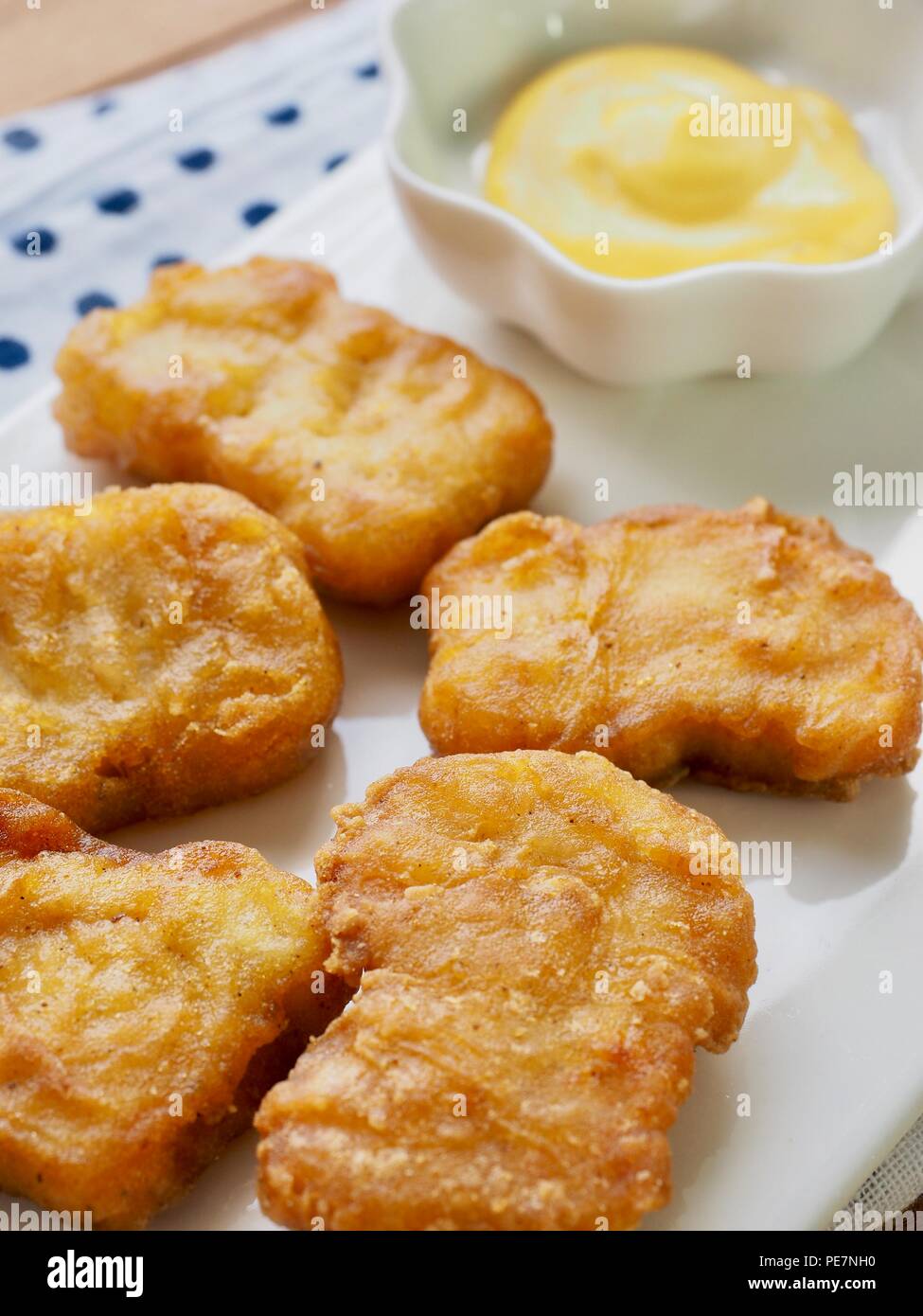 Chicken nuggets and honey mustard sauce Stock Photo Alamy