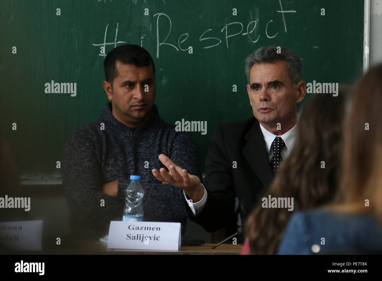 Speakers answer questions from teenagers during an Oct. 17, 2015, panel discussing discrimination and respect for others, during a Violence Free Future event in Kacanik, Kosovo. More than 100 students attended the event sponsored by the Pristina Rotary Club and participated in talks about respect for minorities, respect for women, and how everyone can make a difference in their own communities by solving problems without violence. (U.S. Army photo by Staff Sgt. Mary Junell, Multinational Battle Group-East) Stock Photo
