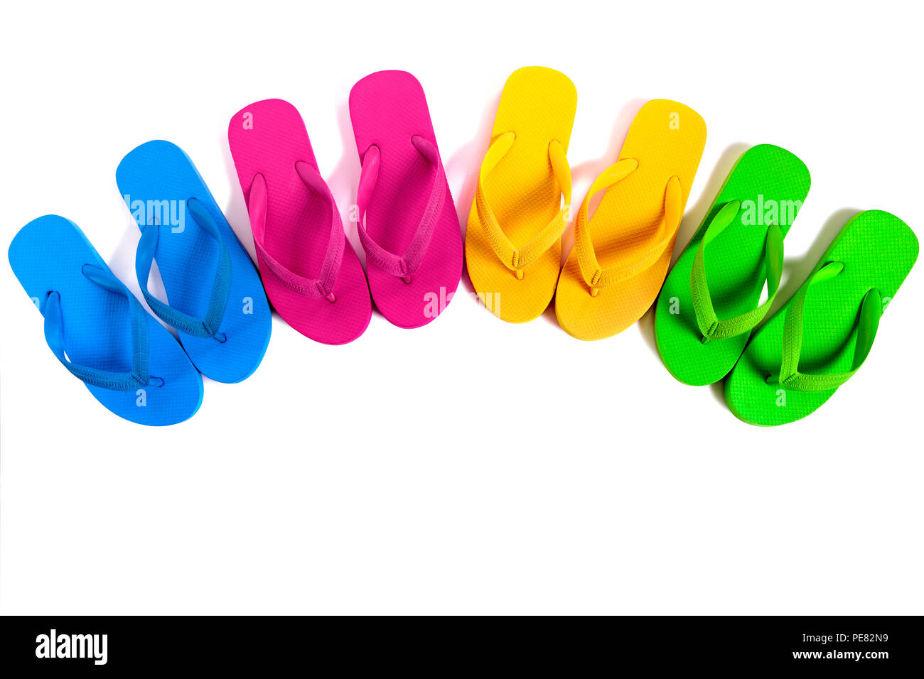 Summer beach flip flops row isolated on white background Stock Photo ...