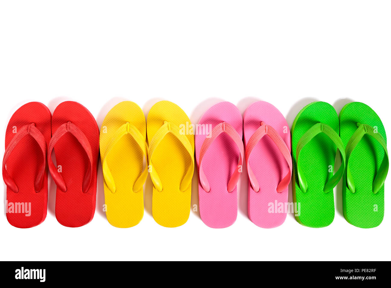 Summer beach flip flops row isolated on white background Stock Photo ...