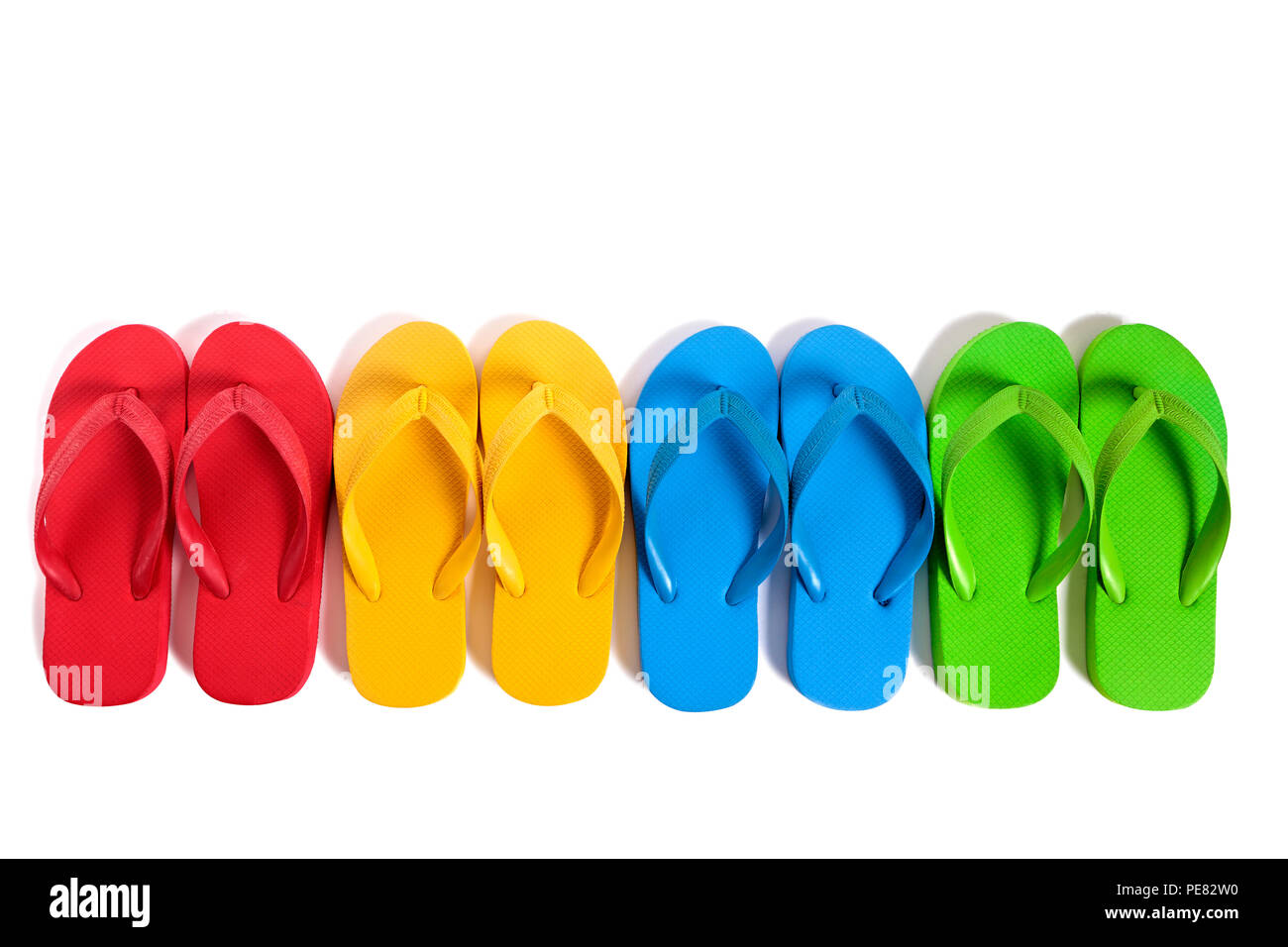 Summer beach flip flops row isolated on white background Stock Photo ...