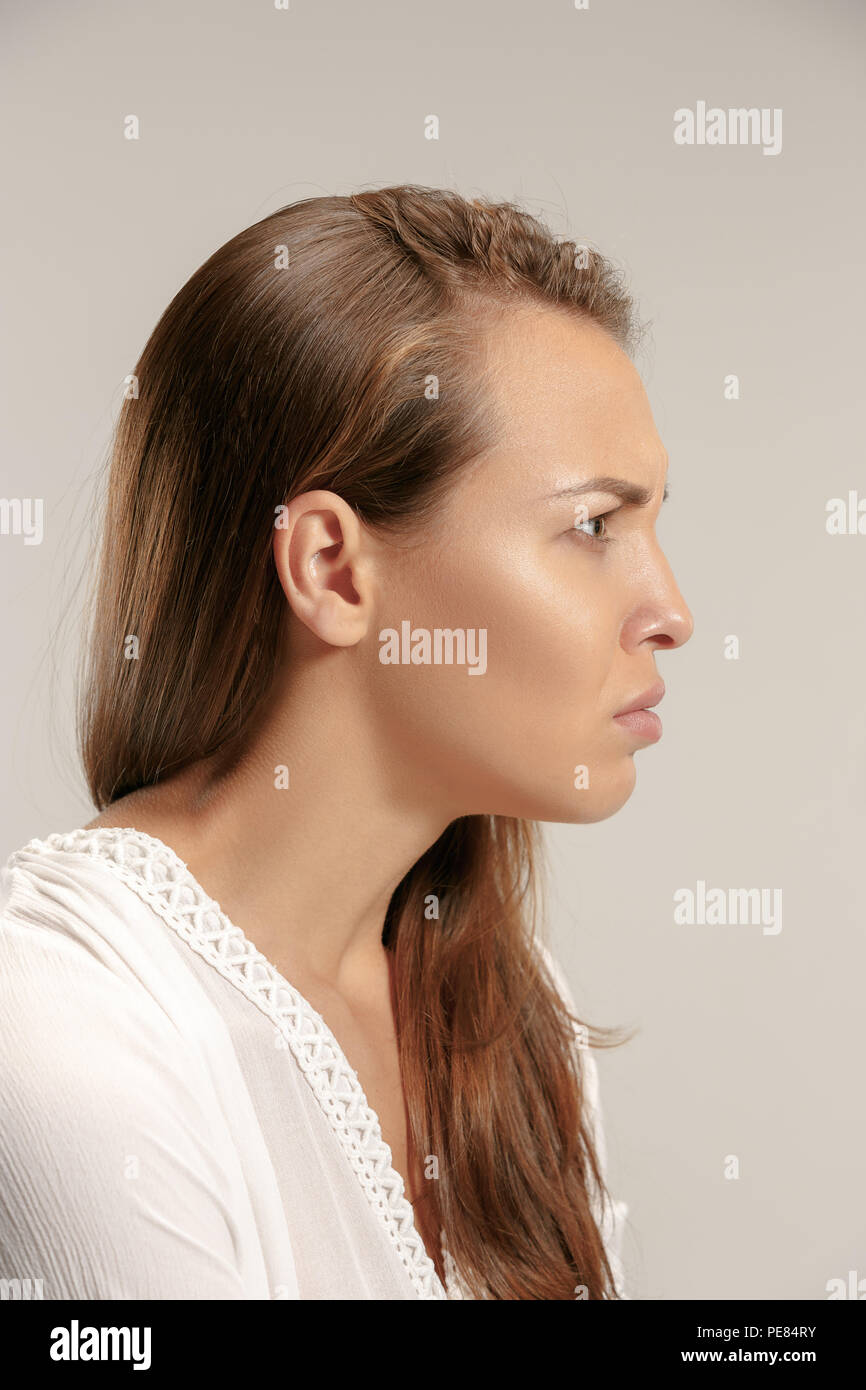 Thinking Emotional Beautiful Woman in Profile Looking Down with Stock Image  - Image of adult, female: 120138289