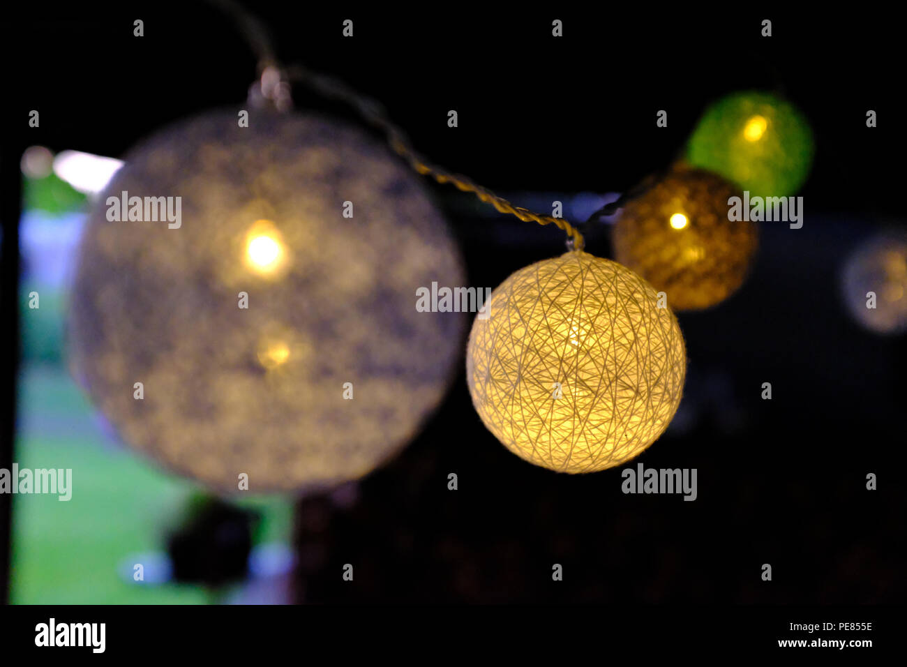 Solar garden lights at night time Stock Photo Alamy