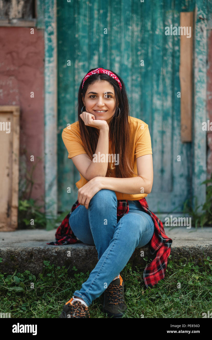 Young happy woman portrait with yellow t shirt Stock Photo