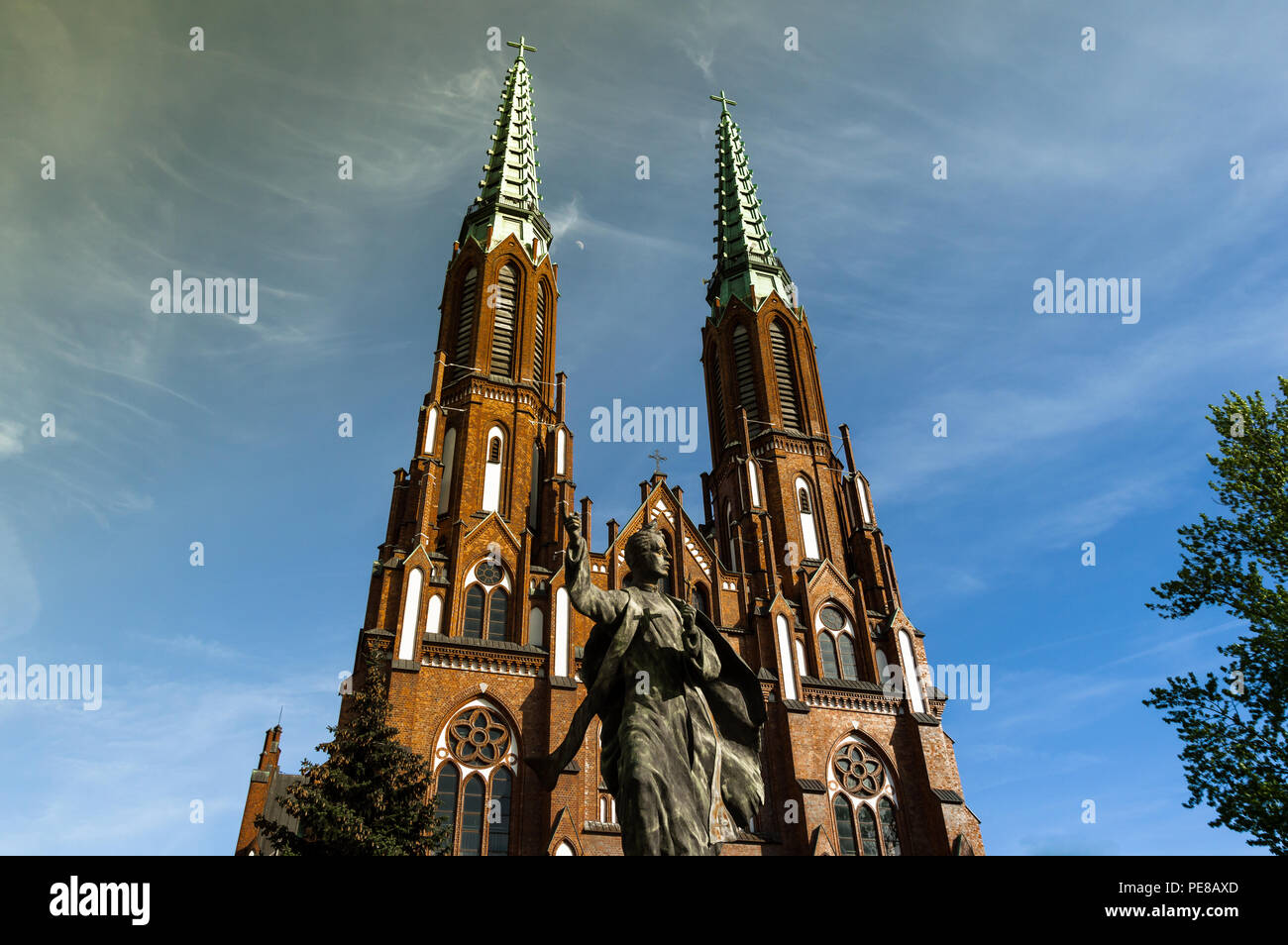 Main facade of Cathedral of St. Michael the Archangel and St. Florian the Martyr in Warsaw, Poland. Views of the sculpture of the entrance. Stock Photo
