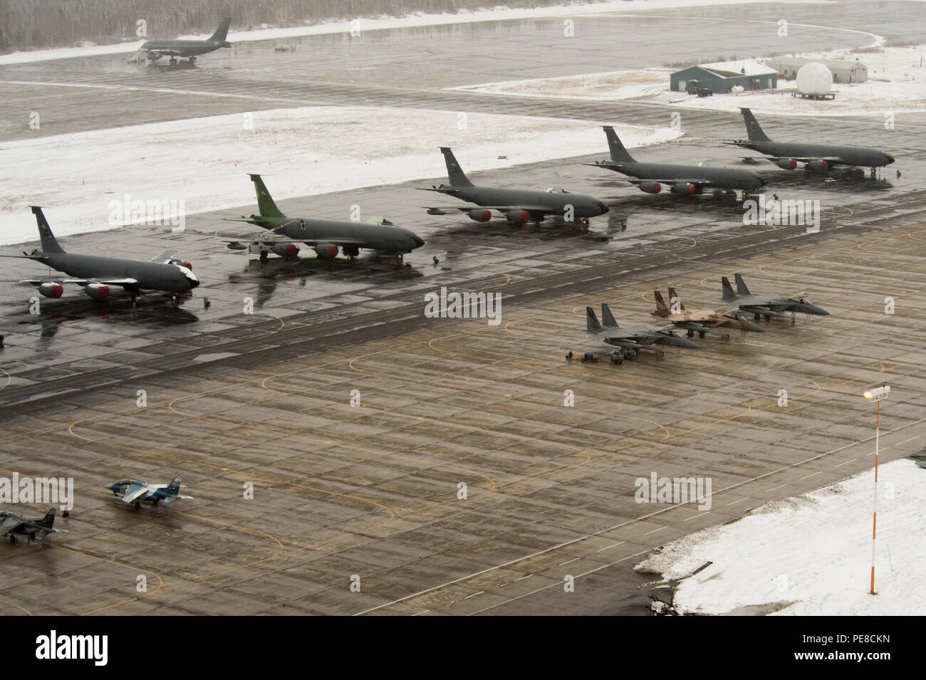 Military aircraft sits on the flight line during Vigilant Shield 16 at 5 Wing Goose Bay, Canada, Oct. 23, 2015. From Oct. 15 to 26, 2015, approximately 700 members from the Canadian Armed Forces, the United States Air Force, the United States Navy, and the United States Air National Guard are deploying to Iqualuit, Nunavut, and 5 Wing Goose Bay, Newfoundland and Labrador for Exercise Vigilant Shield 16. (U.S. Air Force photo by Tech. Sgt. Joshua J. Garcia/Released) Stock Photo