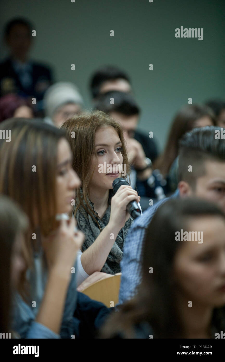 A student asks U.S. Army Brig. Gen. Giselle Wilz, NATO Headquarters Sarajevo commander, a question during her visit to the University of Tuzla's Faculty of Law in Tuzla, Bosnia and Herzegovina, Oct. 26, 2015. Wilz visited the university to meet with students and discuss the benefits of being a member of NATO. (U.S. Air Force photo by Staff Sgt. Clayton Lenhardt/Released) Stock Photo