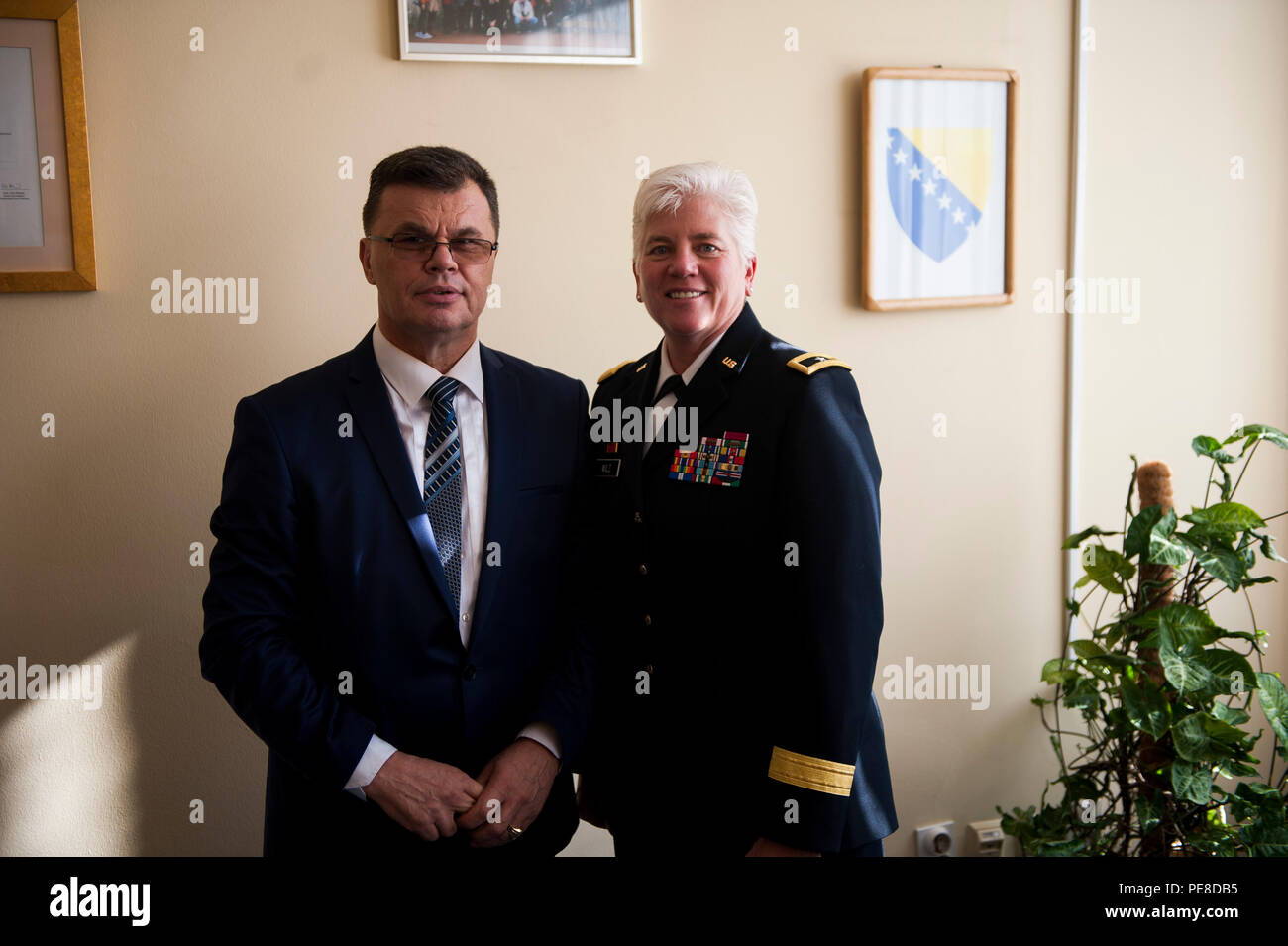 U.S. Army Brig. Gen. Giselle Wilz, NATO Headquarters Sarajevo commander, poses with Dr. Izudin Hasanovic, the dean of University of Tuzla's Faculty of Law, during a visit to Tuzla, Bosnia and Herzegovina Oct. 26, 2015. Wilz visited the university to meet with students and spoke about NATO and NHQSa’s mission. (U.S. Air Force photo by Staff Sgt. Clayton Lenhardt/Released) Stock Photo