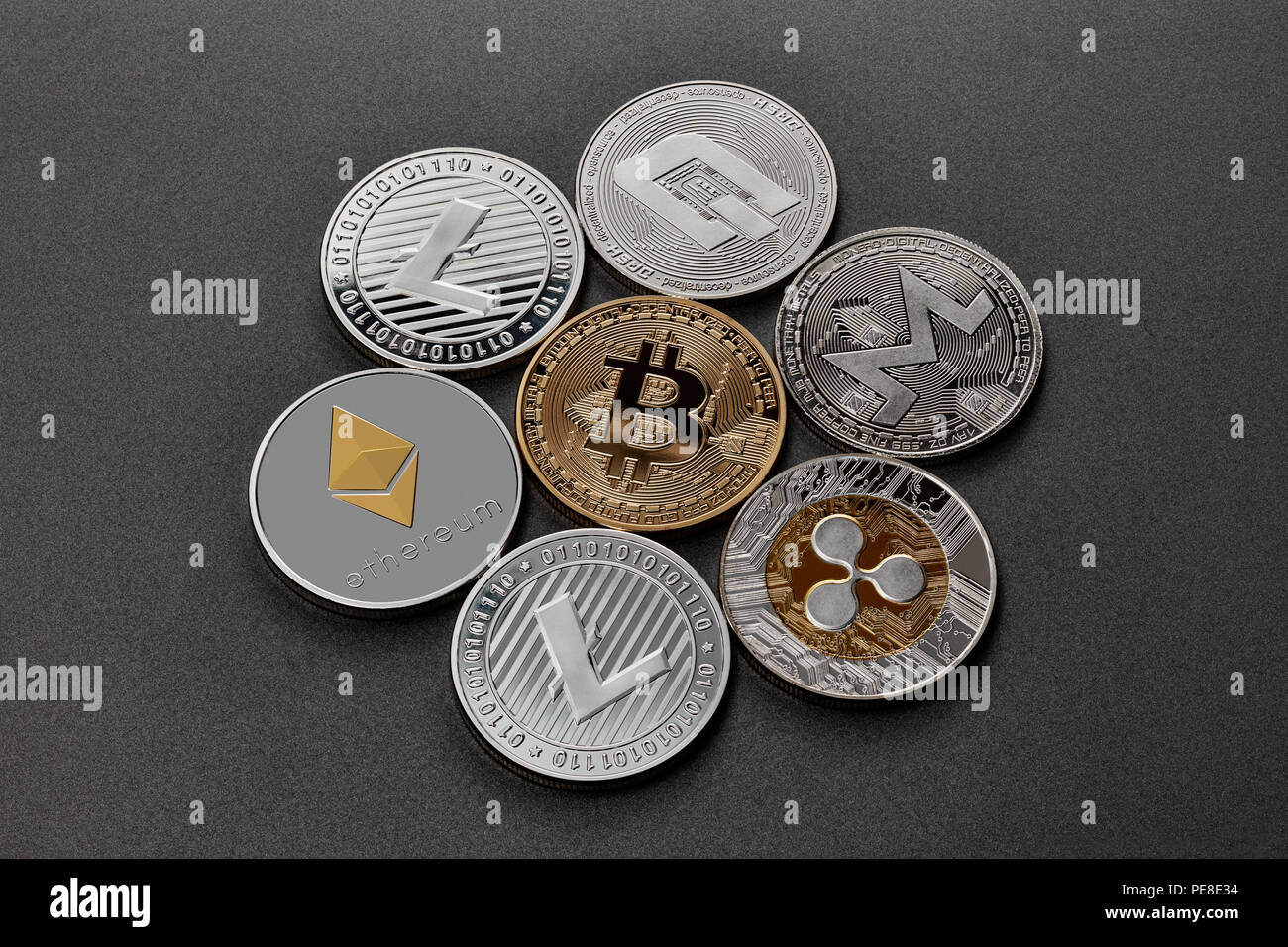 Gold and silver coins are monero, ripple, bitcoin, litecoin, ethereum,  dash, on a black background. Cryptocurrency and blockchain trading concept.  Top Stock Photo - Alamy