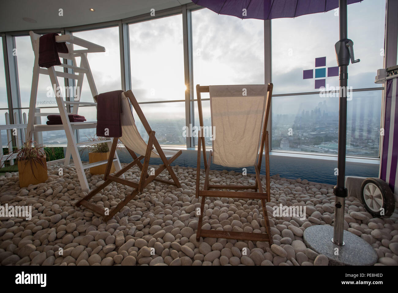 Relax On Traditional Seaside Deck Chairs And Soak Up Views Of The