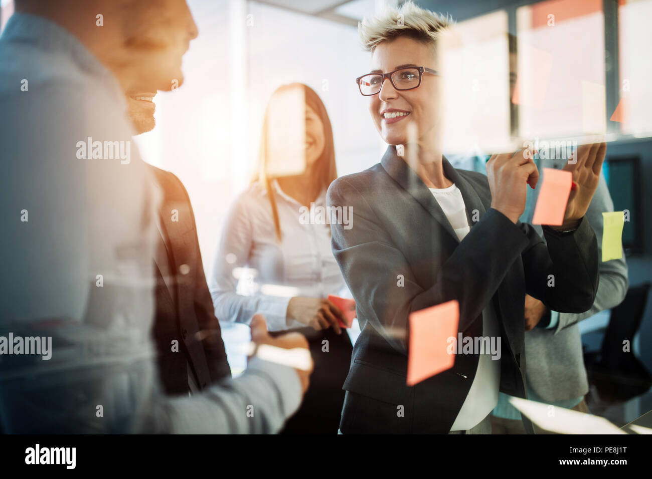 Business people planning strategy in office together Stock Photo