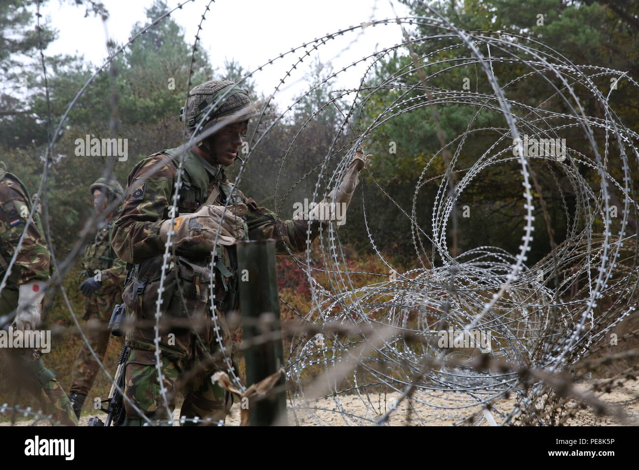 A Dutch soldier from the 112th Engineer Company, 45th Mechanized ...