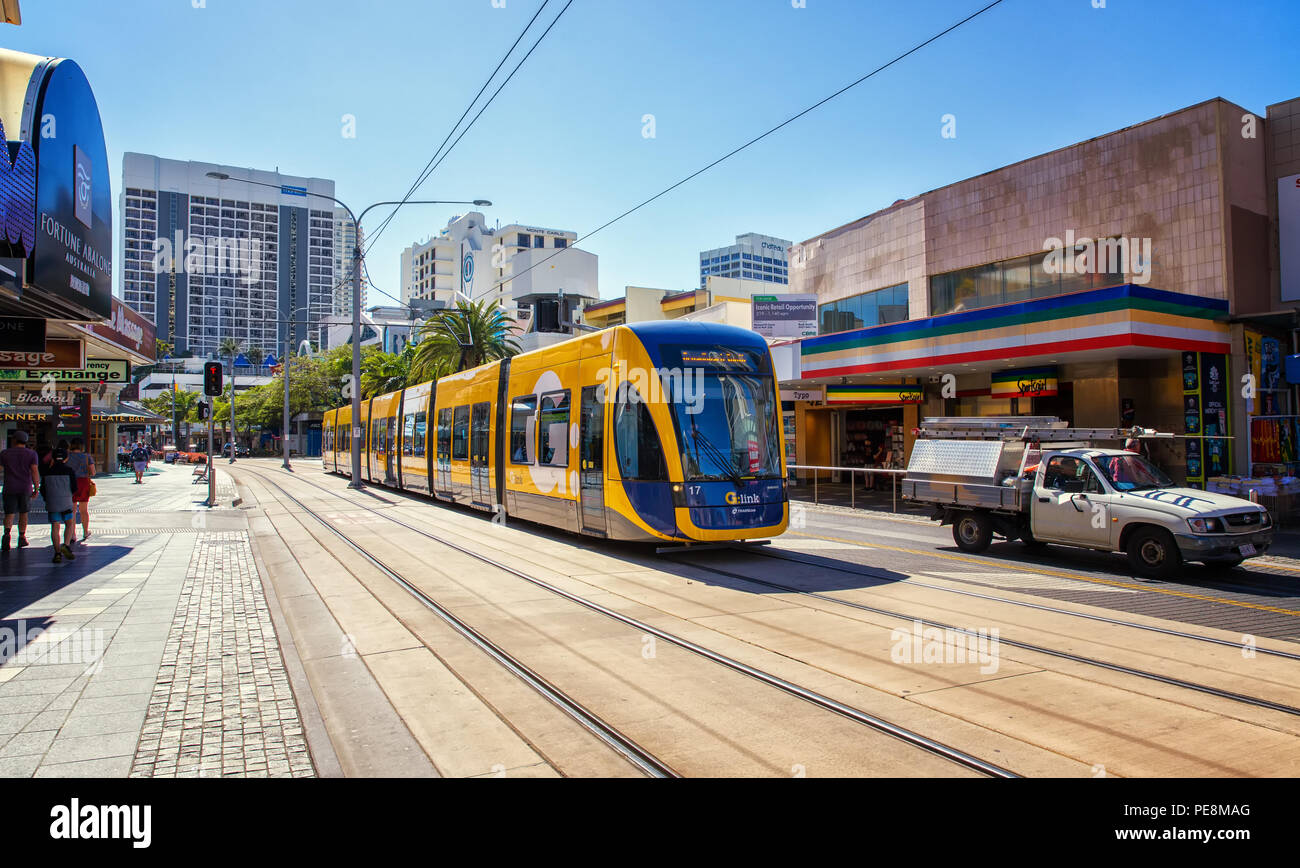 SURFERS PARADISE, AUSTRALIA - AUGUST 10,2018: A tram on the G:Link light rail system approaches Cavill Avenue station. Stock Photo