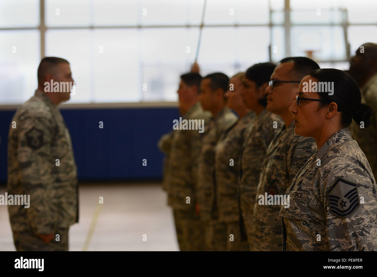 Langley Top Three organization members stand in marching formation