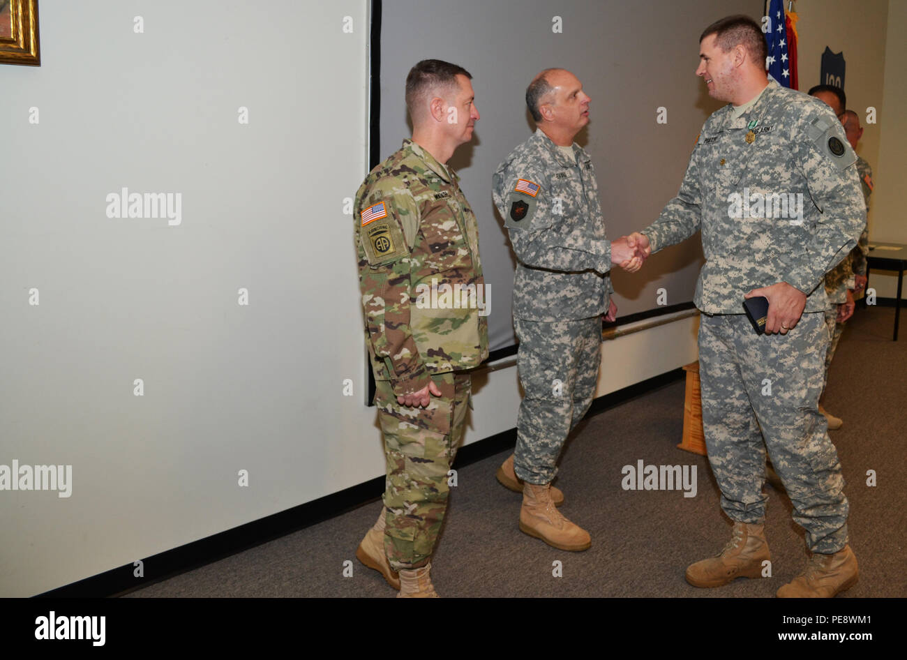 Brig. Gen. Jason Walrath, commander 100th Training Division, looks on ...