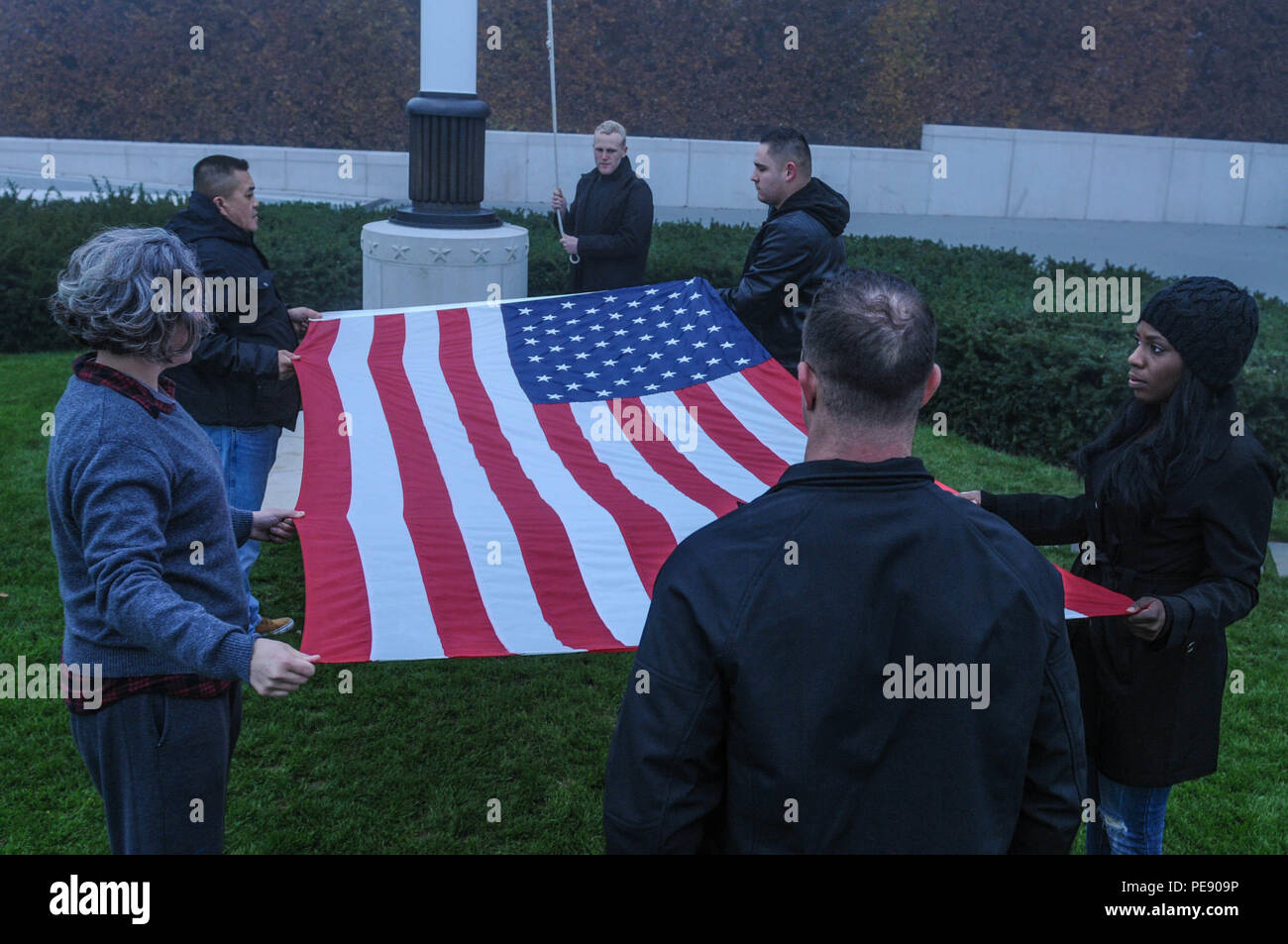 The 4th Infantry Division Mission Command Element lowers the flag and ...