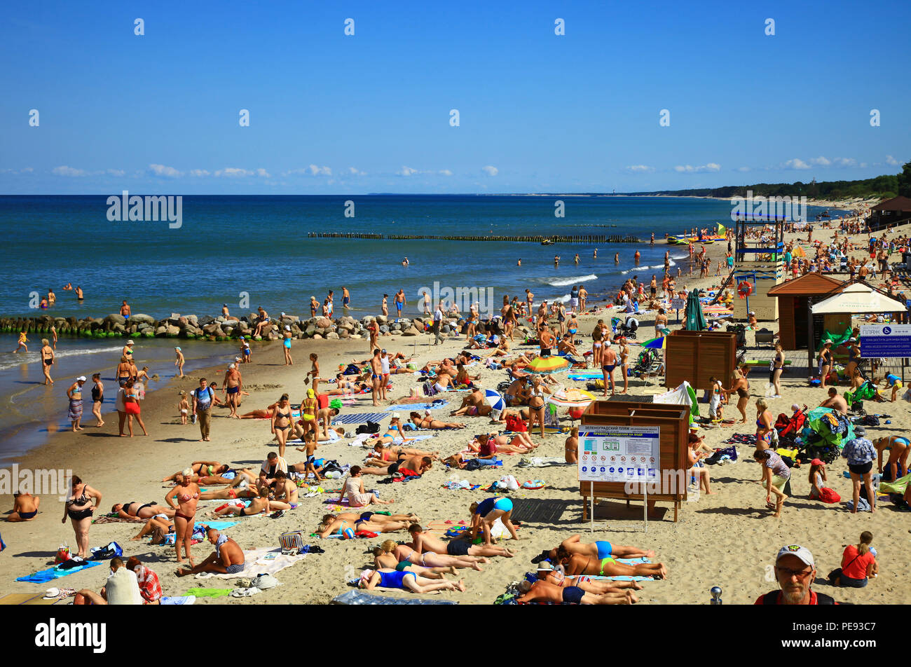 Zelenogradsk, Russia - August 17, 2017: A crowd of bathers in Zelenogradsk beach located on the Baltic Sea coast, Russia. Stock Photo