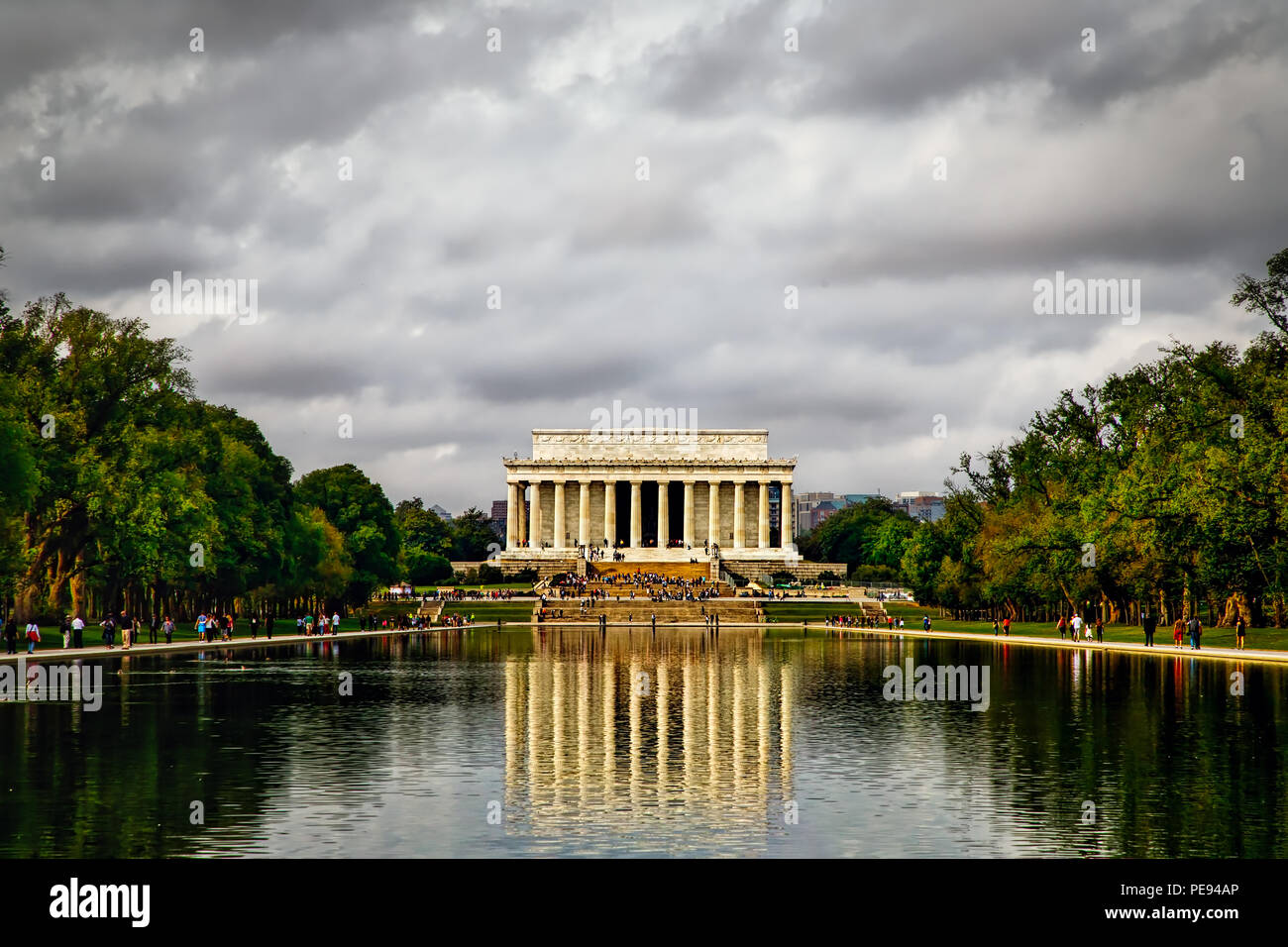 People walking the National Mall in front of the Lincoln Memorial in Washington DC. Stock Photo