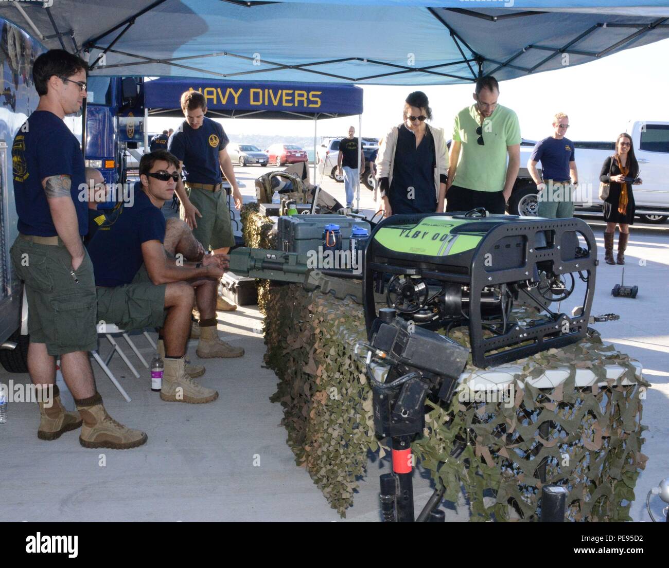 151111-N-NH654-007 SAN DIEGO  (Nov. 11, 2015) Sailors from Explosive Ordnance Disposal (EOD) Mobile Unit 11 display and discuss the tools of EOD with the public during the Salute to Service Festival.  The Salute to Service Festival is held annual on the USS Midway on Veterans Day. (U.S. Navy photo by Lieutenant Patricia Kreuzberger/Released) Stock Photo