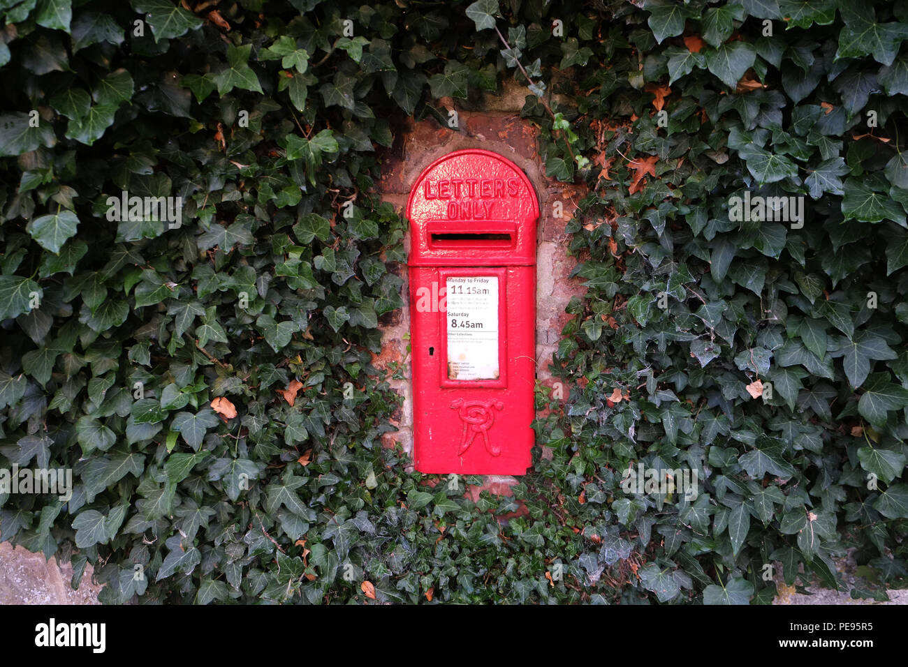 Victorian letterbox in ivycovered wall, Woolstaston, near Church