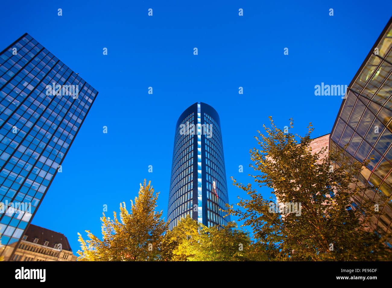 Germany, Dortmund, the RWE Tower, left hand the building of the Signal-Iduna insurance company, right hand the municipal library.  Deutschland, Dortmu Stock Photo
