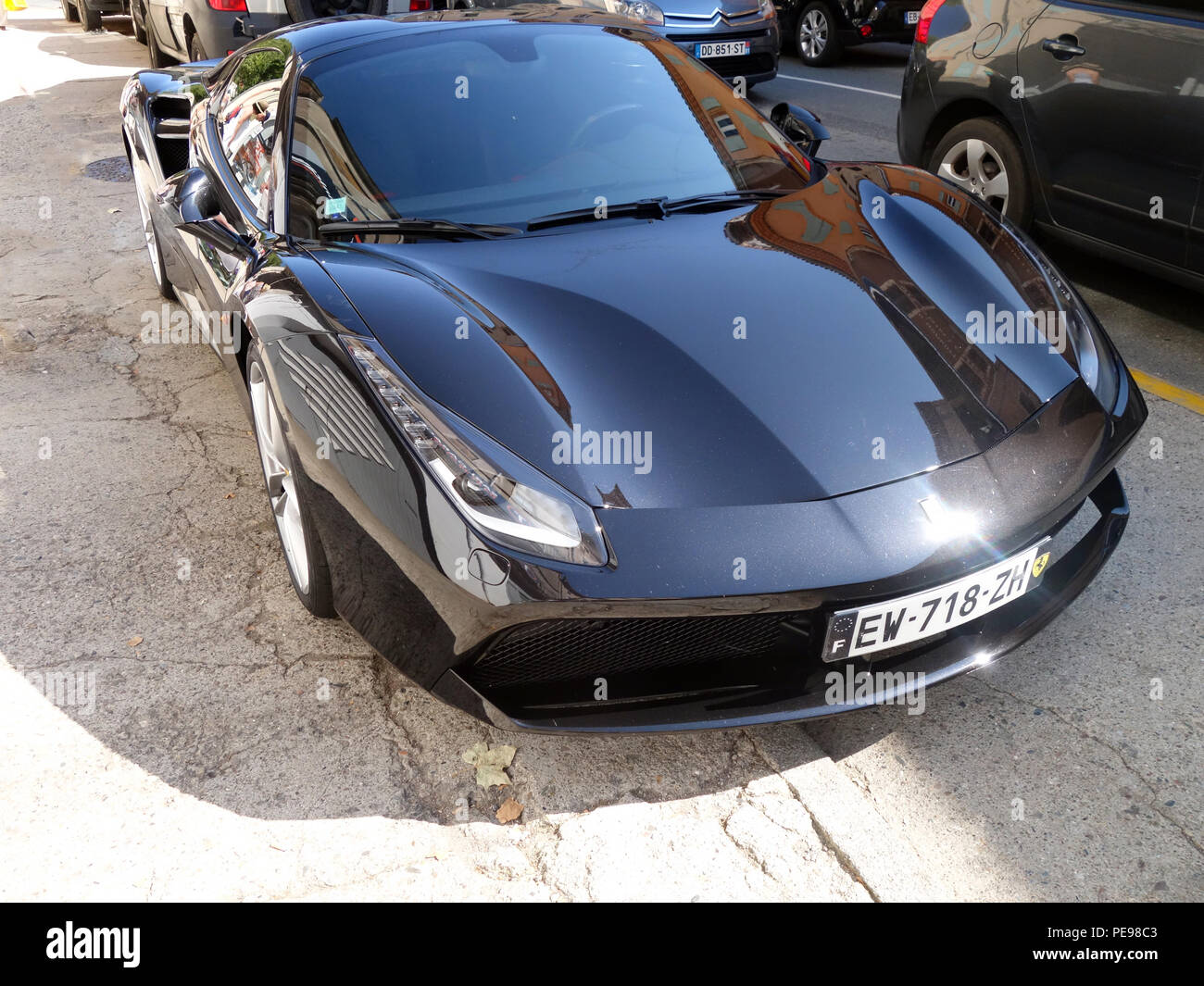 A Black Ferrari 488 Spider Parked On A Street In France