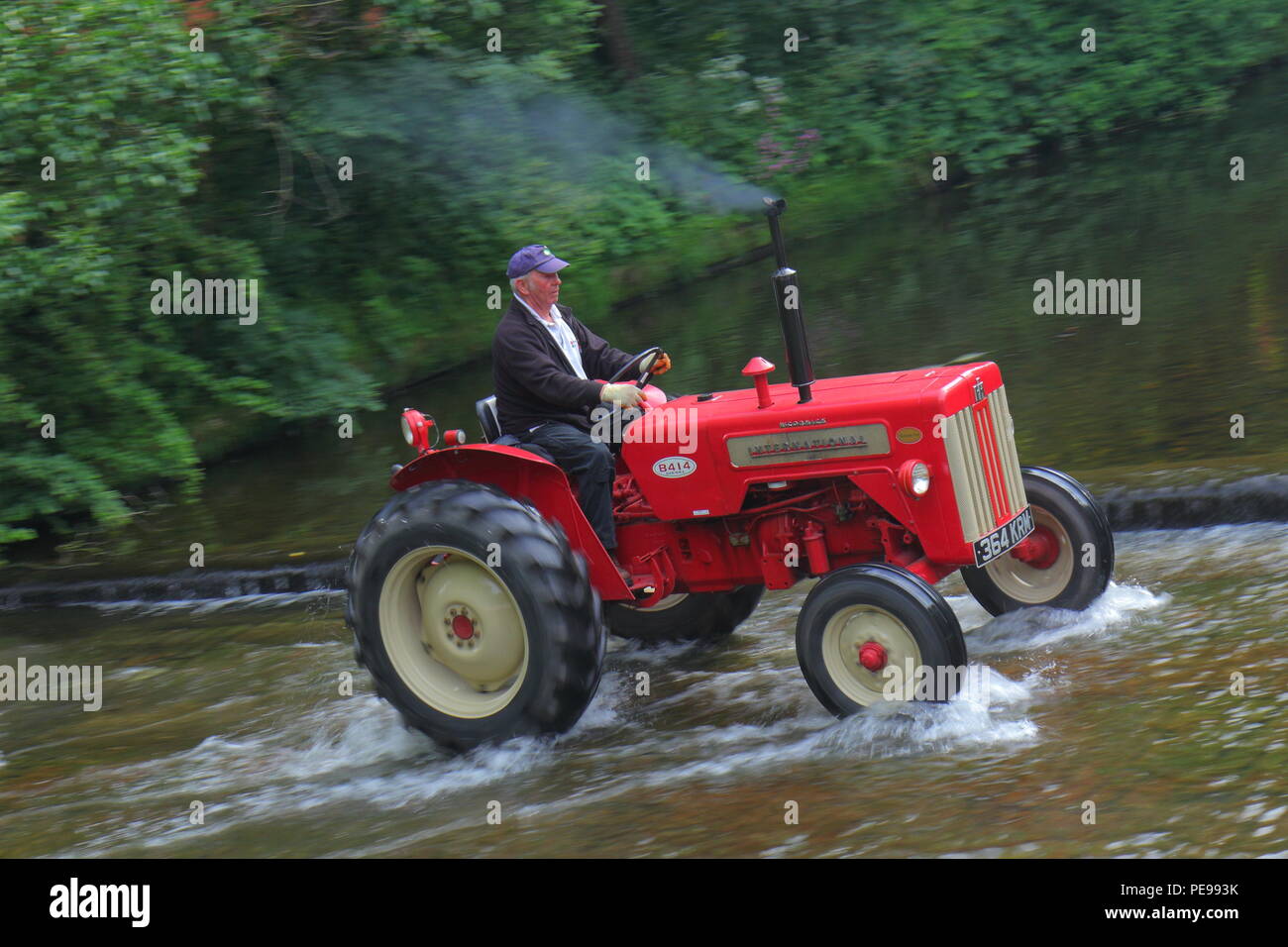 McCormick International B414 tractor crosses the River Skell in Ripon