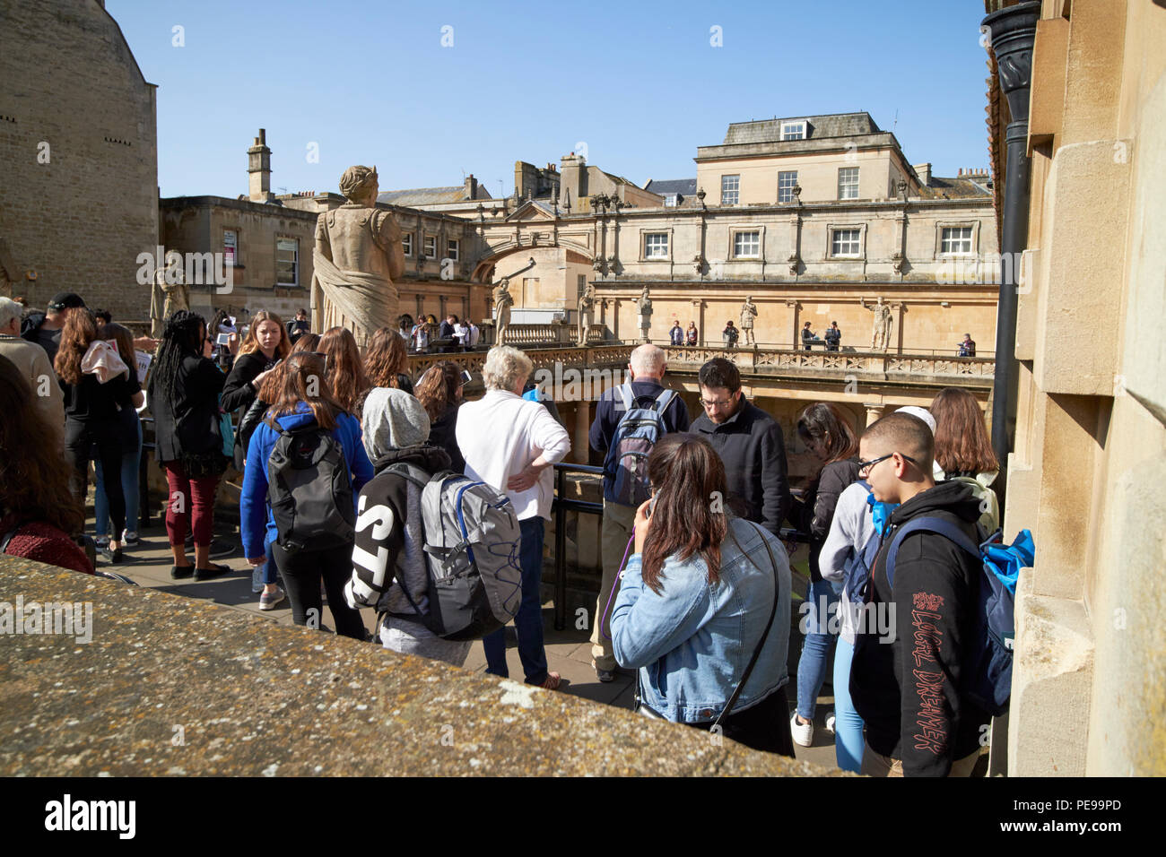 tourists visit the roman baths Bath England UK Stock Photo
