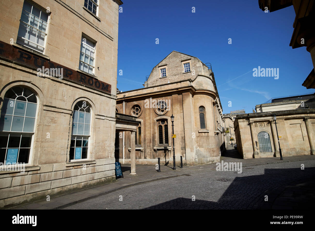 the old hetling pump room, st johns hospital and cross bath on hot bath street in the old town centre of Bath England UK Stock Photo