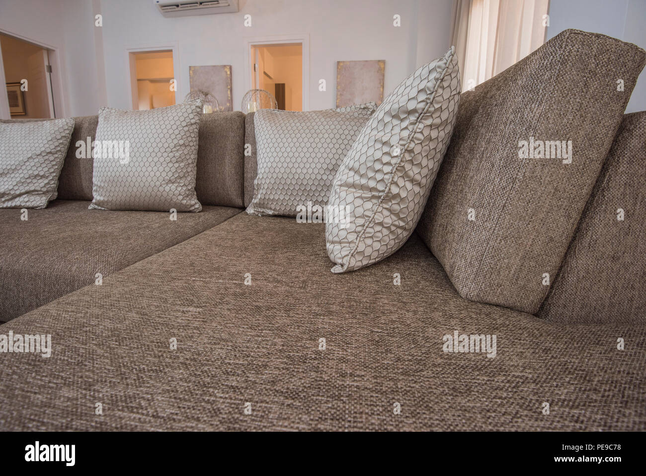 Living room lounge sofa in luxury apartment show home showing interior