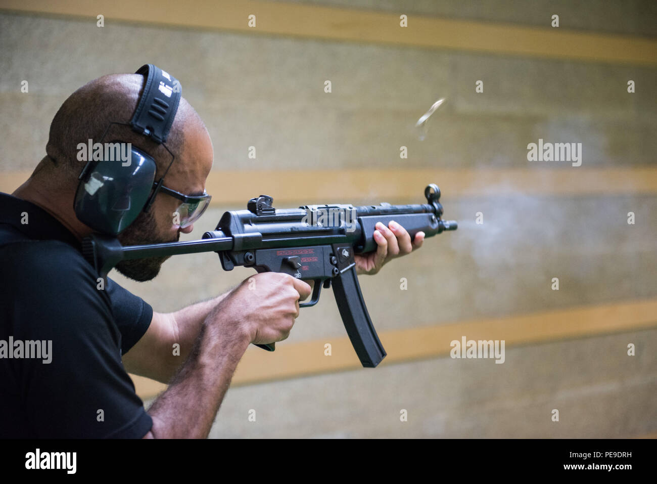 The Heckler Koch Mp5 Submachine Gun Of U S Air Force Senior Airman Samuel Caines Assigned To The Supreme Allied Commander Europe Security Detachment Ejects A Bullet Casing At The Training Support