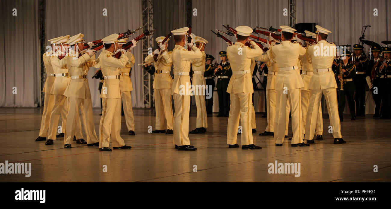 Japan Ground Self-Defense Force service members perform a "silent" drill as part of the Japan Self Defense Force Marching Band Festival Nov. 13 at the Nippon Budokan Arena, Tokyo. The 51st annual festival brings military bands from the U.S., the Republic of Korea and Japan to perform together in front of thousands of people to bond through music and military culture. The soldiers are with the 302nd Military Police Company, JGSDF. (U.S. Marine Corps photo by Cpl. William Hester/ Released) Stock Photo