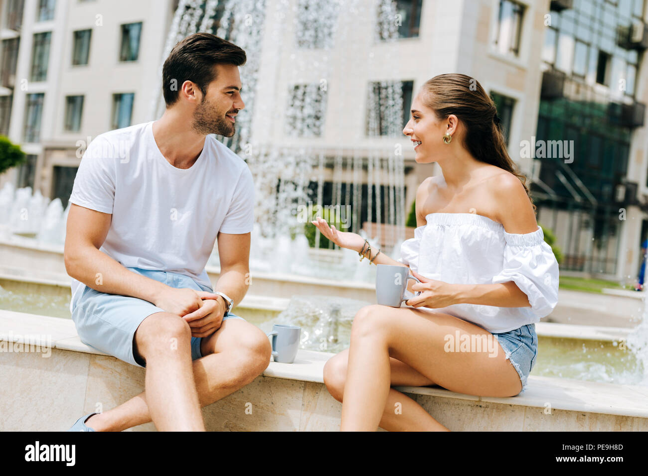 Pleasant joyful woman talking to her boyfriend Stock Photo - Alamy