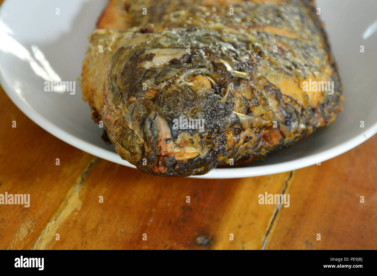 deep fried mango fish on dish Stock Photo Alamy