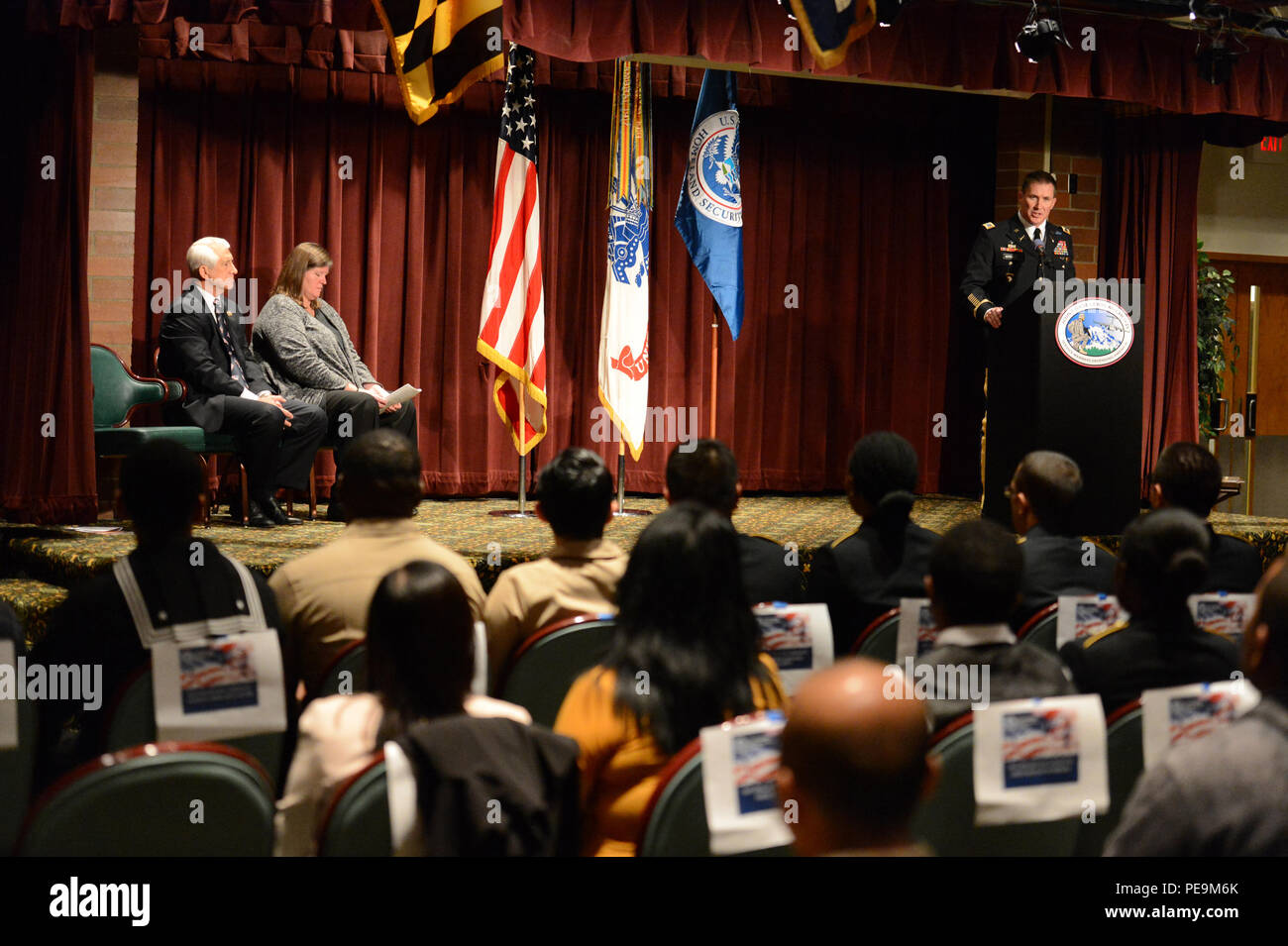 U.S. Congressman Dave Reichert listens as Colonel Daniel JBLM