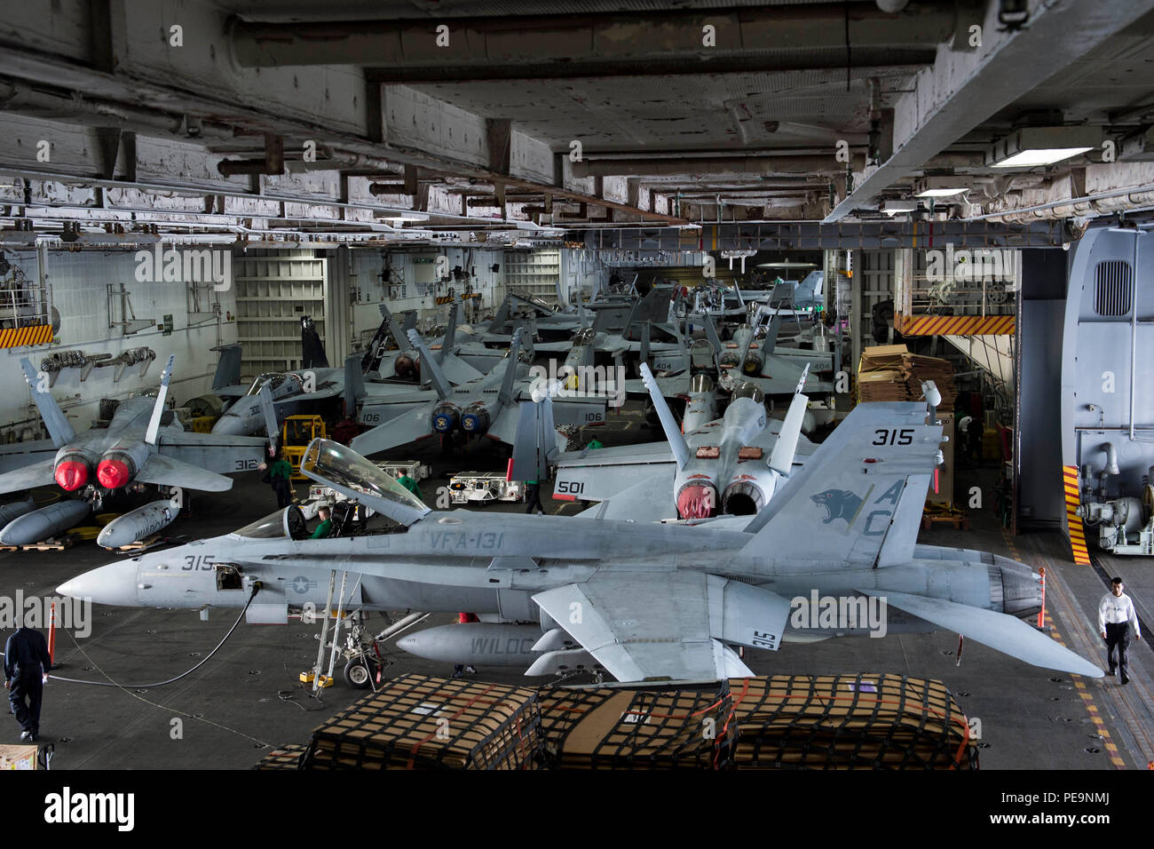 151125-N-Kk394-013 Atlantic Ocean (Nov. 25, 2015) - Sailors Conduct  Maintenance On Various Aircraft In The Hangar Bay Of The Aircraft Carrier  Uss Dwight D. Eisenhower (Cvn 69). Dwight D. Eisenhower, With Embarked