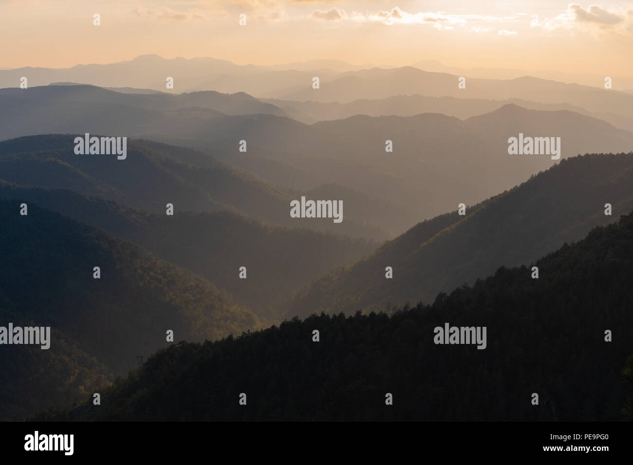 Misty mountains in a distance Stock Photo - Alamy