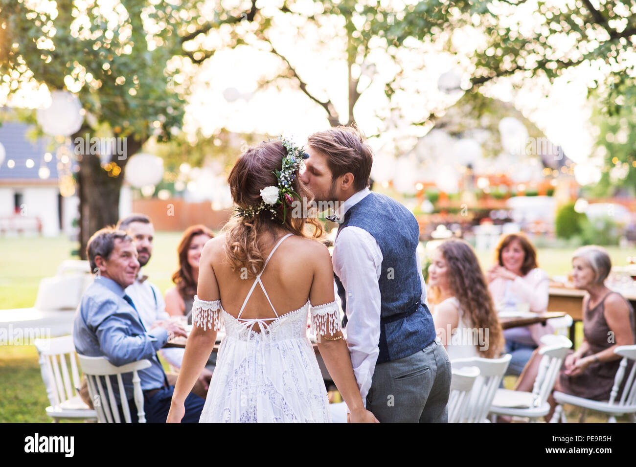 Newly married couple kissing in hi-res stock photography and images - Alamy