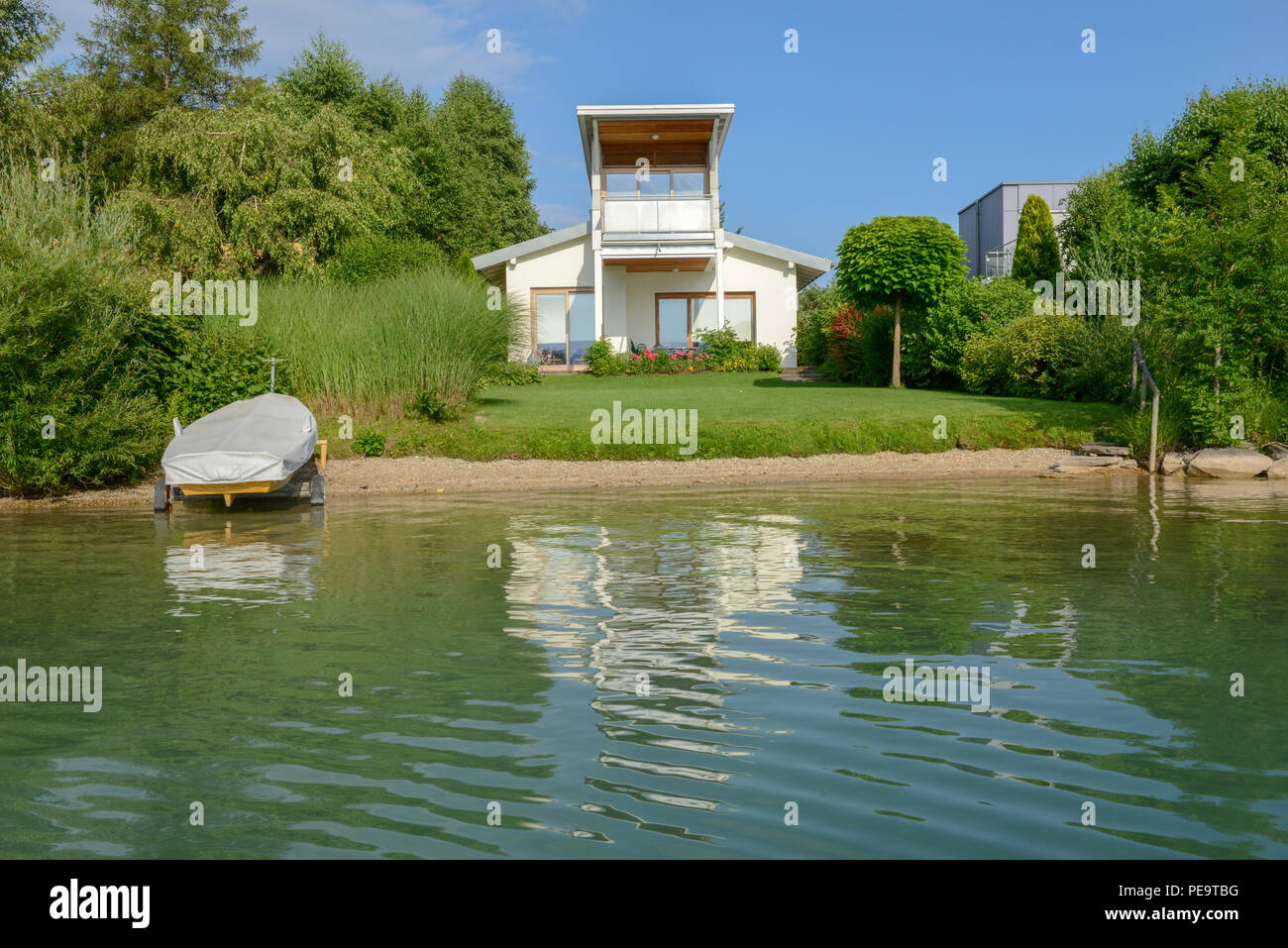 Modern House At Lake Fakkar On Carinthia In Austria Stock Photo